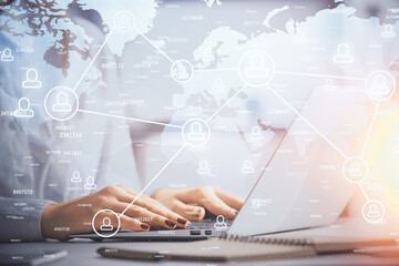 Double exposure of woman hands typing on computer and social network theme hologram drawing. People media concept.