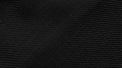 dark black textile fabric texture use for background. close-up or macro view of textile dark black fabric showing detailed of fibers.