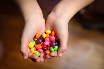 Skittles candies candy in hands