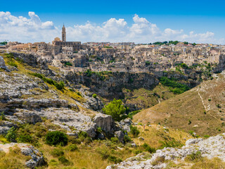 Fototapeta premium Dramatic view of the ancient town of Matera and its deep canyon, Basilicata region, southern Italy 