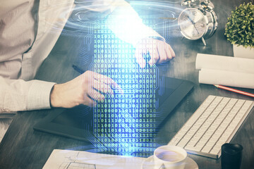 Fototapeta premium Multi exposure of man's hands holding and using a digital device and data theme drawing. Innovation concept.