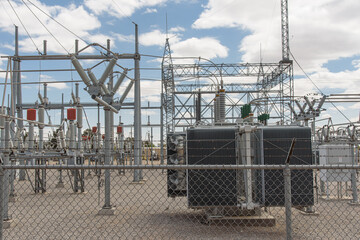 A substation where electricity is dropped from high grid voltages to lower voltages for delivery to customers. 