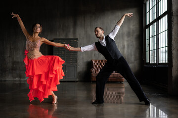 beautiful couple dancing passionate latin tango dance - obrazy, fototapety, plakaty