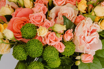 Bouquet with mini pink roses, eustoma, chrysanthemums and sentinels.