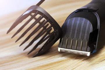 Clipper with a nozzle and blonde hair