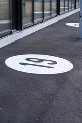 Painted gate number 19 at entrance gate of bus depot of public transportation company. Photo taken May 14th, 2021, Zurich, Switzerland.