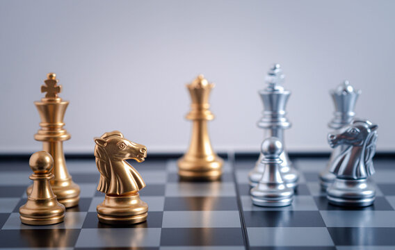  gold  knight Against whithe background, International chess, ideas and competition and strategy, chess board game competition business concept.