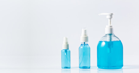 Plastic dispenser sanitizer alcohol gel pump and spray bottle for washing hand hygiene prevention of coronavirus virus studio shot on white background