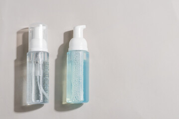 Transparent plastic cosmetic foam pump bottle mock-up.