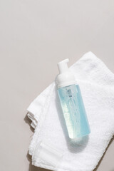 Transparent plastic cosmetic foam pump bottle mock-up.