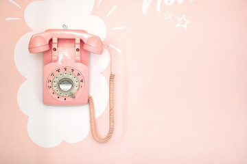 A retro phone hangs on the wall in a pastry shop. Pastry shop, ambience