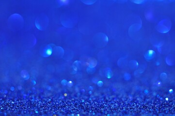 Abstract blue bokeh glitter on nature background
