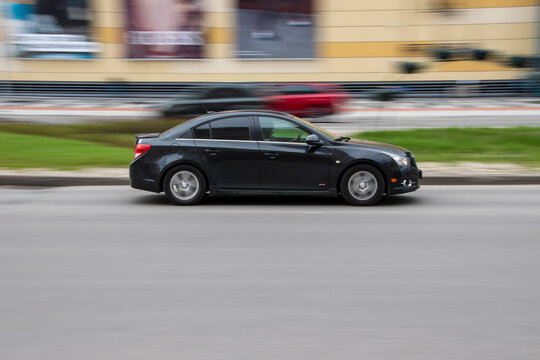 Ukraine, Kyiv - 26 April 2021: Black Chevrolet Cruze car moving on the street. Editorial