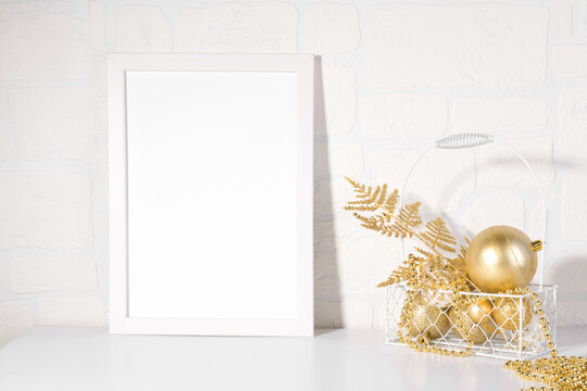 White frame mockup with Christmas gold glitter baubles, gold fern, add quote, headline, or design, great for lifestyle bloggers and social media campaigns