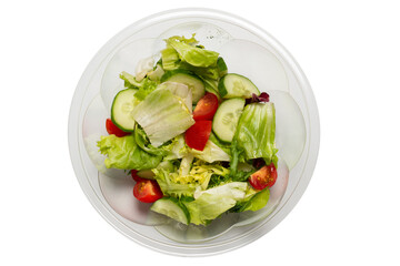 Salad with fresh vegetables isolated on a white background.