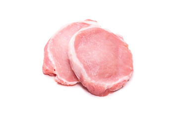 Raw pork pieces isolated on a white background.