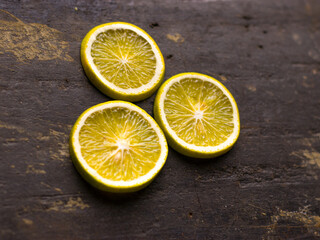 Fresh Mousambi OR Green lemon stock image on dark background.