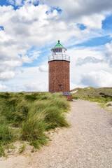 Brick lighthouse on dune. Sylt.