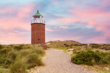 Fototapeta na wymiar Brick lighthouse on dune. Sylt.