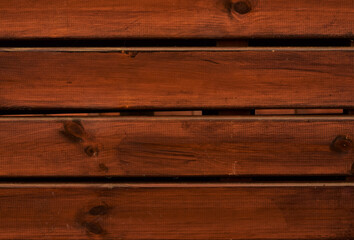 
Background with ipe wooden boards, in reddish tones.
Copy space. 