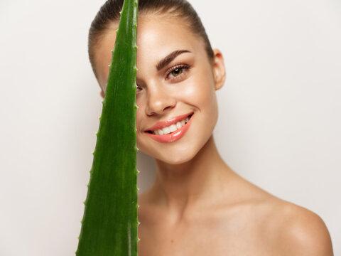 Happy Woman Smiling And Holding Green Aloe Leaf In Hand Fun 