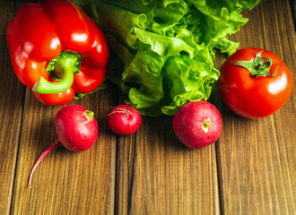 Set of vegetables for salad diet. Cooking salad in restaurant kitchen. Free advertising space.