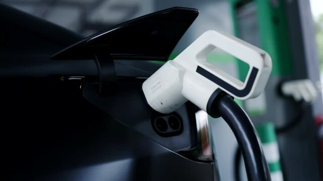 Electric car charger. Automotive technology of the future. Save energy And protect the environment. 