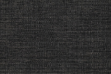 Fabric texture canvas. Cotton background. Detail close up for dress or other modern fashion textile print. Gray and black textured design.