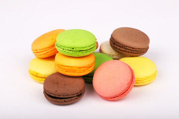 Colorful macarons isolated on white background.