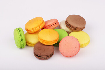 Colorful macarons isolated on white background.