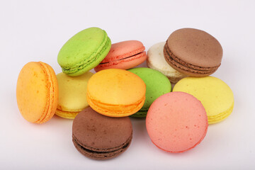 Colorful macarons isolated on white background.