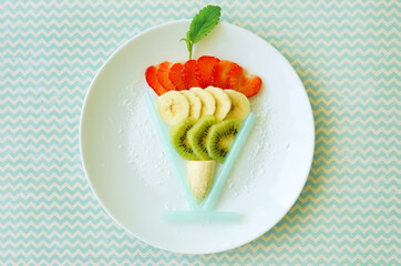 Creative dessert made of fruits. Food art. Idea for lunch. 