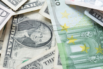 Euro and Dollar banknotes, trade between USA and European Union. Forex exchange and commerce with US Dollar and Euro