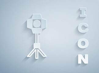 Paper cut Studio light bulb in softbox icon isolated on grey background. Shadow reflection design. Paper art style. Vector