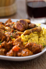 Polenta and beef stew on a plate. High quality photo.
