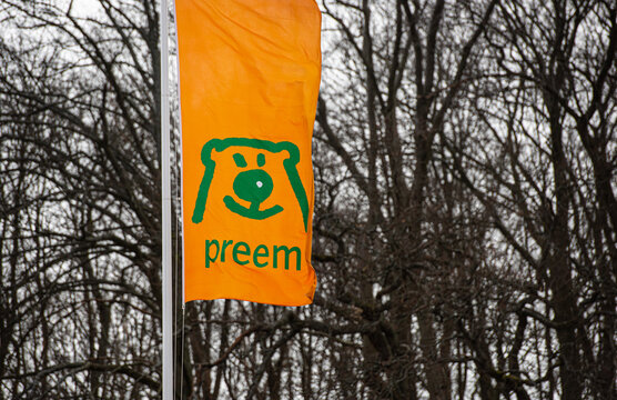 Gothenburg, Sweden - February 27 2021: Orange flag with Preem logo..