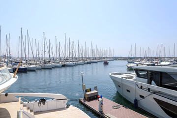 Yacht club and marina long view. Boats and yachts in the marina.