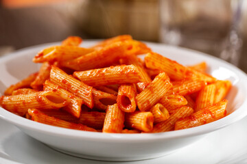 Pasta with Tomato Sauce on a plate. High quality photo.