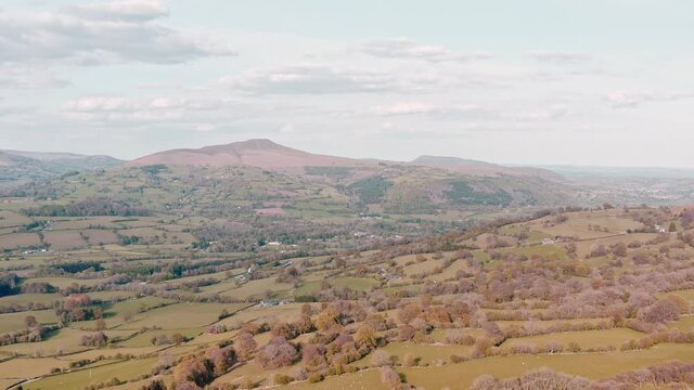 4k Aerial shot of sugarloaf and skirrid fawr in the distance.