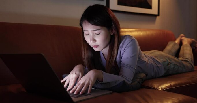 Asian Woman Use Laptop Computers At Night, She Has An Eye Irritation, Blue Light Is Harmful To The Eyes.