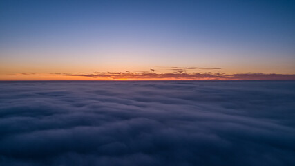 Beautiful sunset above the clouds.