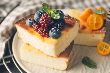 Pieces of cottage cheese casserole on plate, closeup