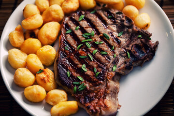 Grilled Beefsteak with Baby Roasted Potatoes. High quality photo.