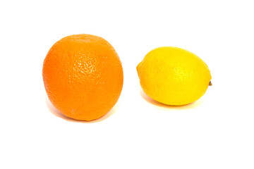 Orange and lemon on a white background. Fruits are a source of vitamins
