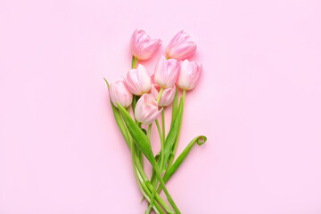 Beautiful tulip flowers on color background