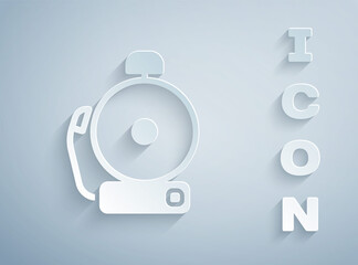 Paper cut Ringing alarm bell icon isolated on grey background. Alarm symbol, service bell, handbell sign, notification symbol. Paper art style. Vector
