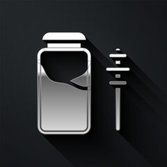 Silver Jar of honey and honey dipper stick icon isolated on black background. Food bank. Sweet natural food symbol. Honey ladle. Long shadow style. Vector