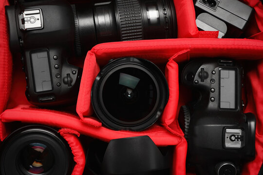 Professional photography equipment in backpack, top view