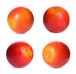 Set with ripe red oranges on white background