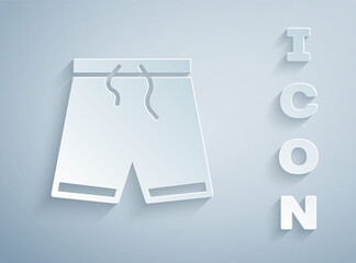 Paper cut Swimming trunks icon isolated on grey background. Paper art style. Vector
